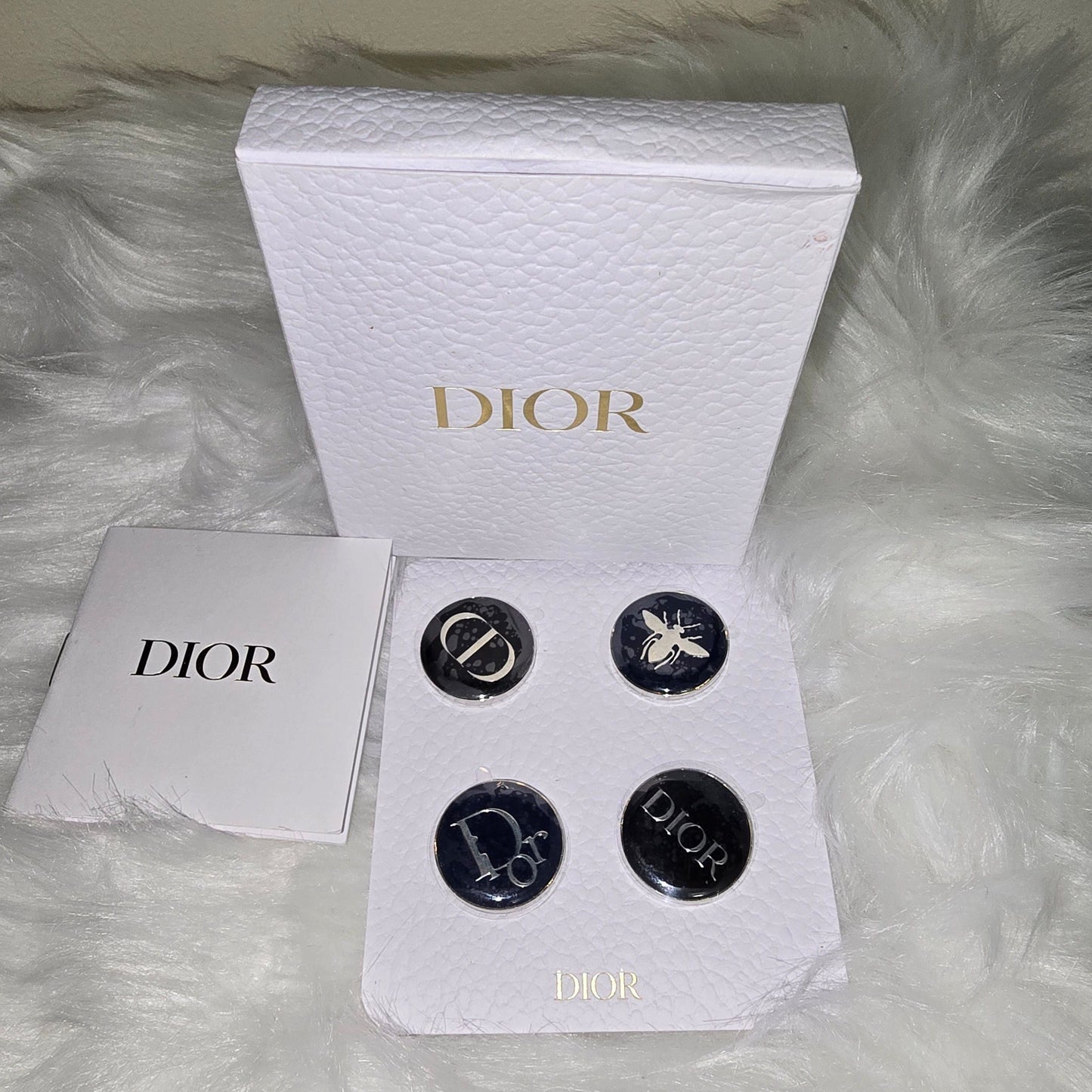 Dior pins in box