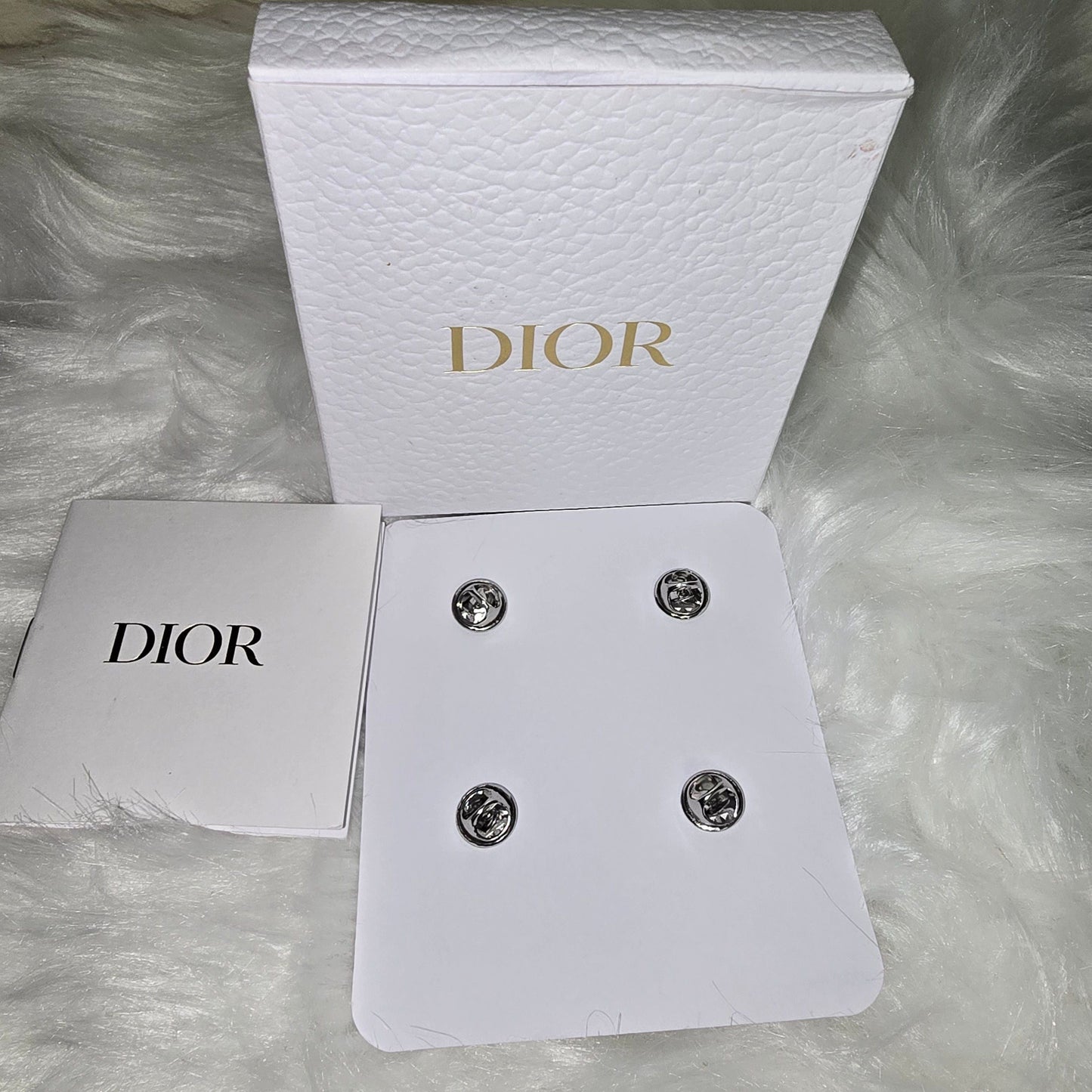 Dior pins in box